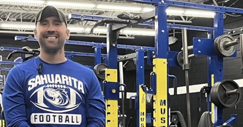 Adult, Man, Person. Text: SAHUARITA FOOTBALL MUS