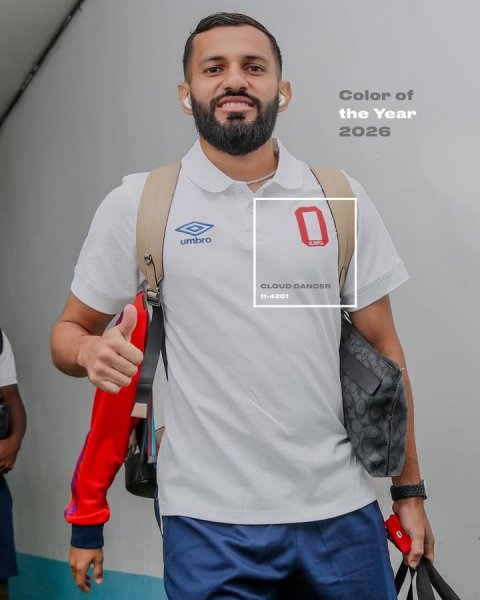 T-Shirt, Finger, Person. Text: Color of the Year 2026 umbro CLOUD DANCER 11-4201