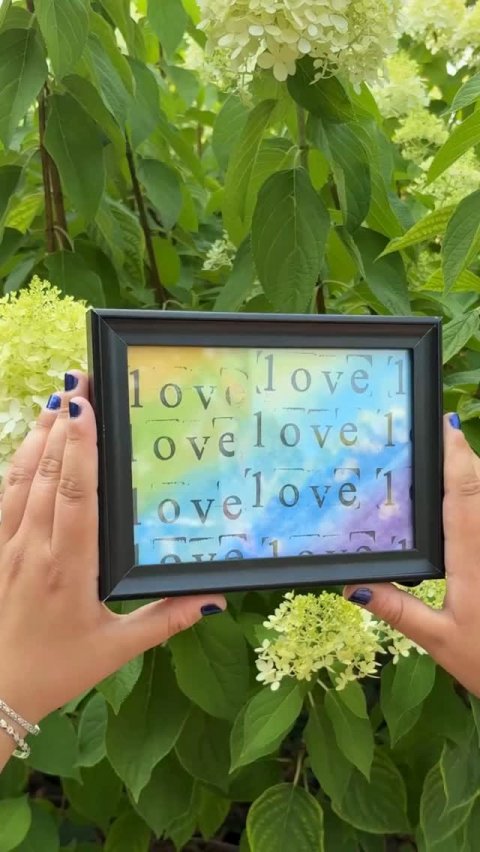 Photo Frame, Monitor, Person. Text: love ove love 1 1