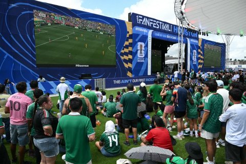 Field, People, Person. Text: Hisense THIS AIN'T OUR FIRST ROO 10 14