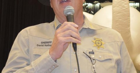 Microphone, Shirt, People. Text: SHERIFF