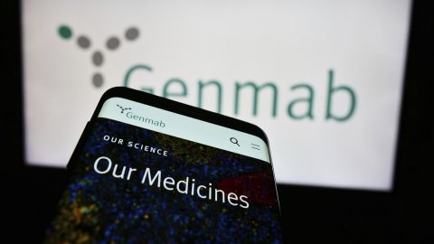 Mobile Phone, Phone, Screen. Text: Genmab OUR SCIENCE Our Medicines