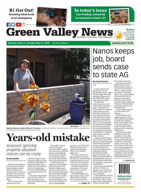 Newspaper, Potted Plant, Person. Text: B1 Get Out! In today's issue Knowing what to do Can Hudbay, Sahuarita in an emergency f Green Valley YOUR News VOICE YOUR NEWS YOUR COMMUNITY Nanos keeps job, board sends case to state AG