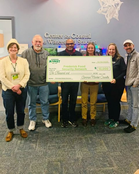 Pants, Groupshot, Jacket. Text: Center for Coastal COMMON MARKET Date Frederick Food Security Network 10,000