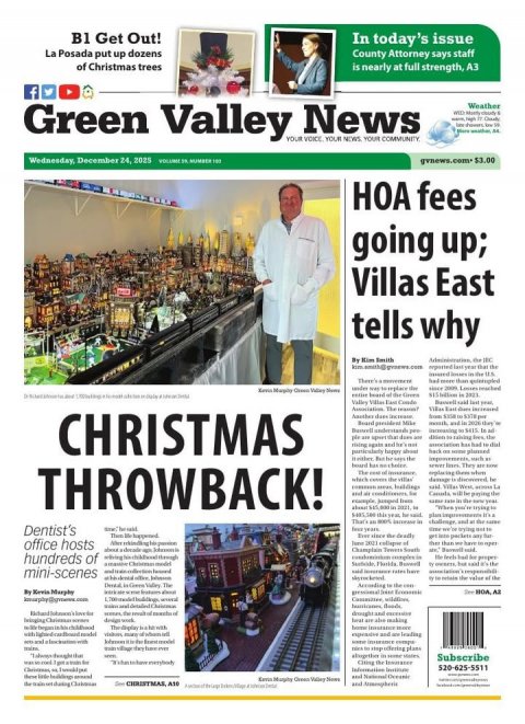 Glove, Man, Person. Text: B1 Get Out! In today's issue La Posada put up dozens County Attorney says staff of Christmas trees is nearly at full strength, A3 f Weather Green Valley YOUR News YOUR YOUR COMMUNEY HOA fees going up; Villas East tells why