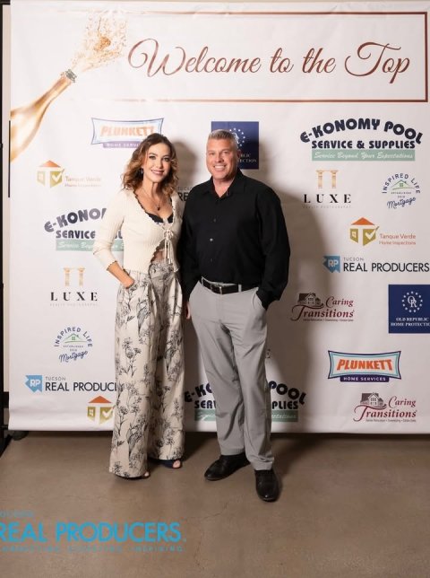 Pants, Person, Woman. Text: Welcome to the Top PLUNKETT E-KONOMY POOL SERVICE &amp; SUPPLIES LUXE INSPIRED - LIFE SERVICE RP REAL PRODUCERS LUXE Caring Transitions - PLUNKETT HOME SERVICES RP REAL PRODUCI POOL Caring PLIES Transitions REAL PRODUCERS