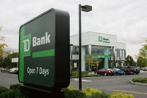 Office Building, Car, Car Dealership. Text: Bank Bank TD Open 7 Days