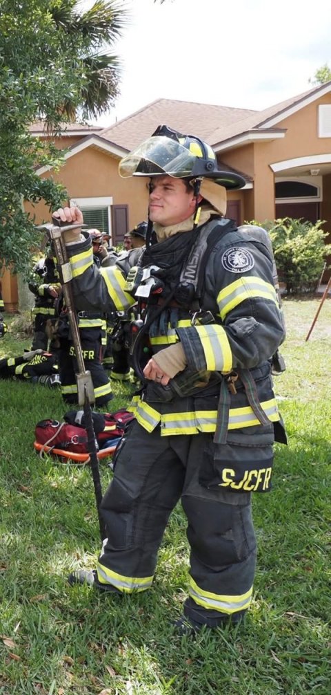 Helmet, Man, Person. Text: S. FR SJCFR
