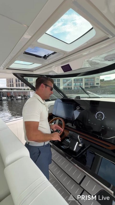 Yacht, Captain, Person. Text: 0° PRISM Live