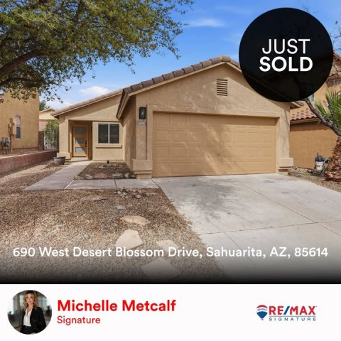 Garage, Indoors, Person. Text: JUST SOLD 690 West Desert Blossom Drive, Sahuarita, AZ, 85614 Michelle Metcalf RE/MAX Signature