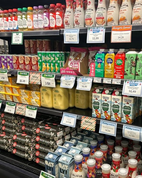 Shop, Indoors, Grocery Store. Text: LIFIA LIFIA ALIFIA DE - - $4.29 $5.99 55.79 52.99