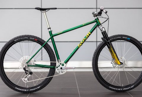 Bicycle, Mountain Bike, Vehicle. Text: SOUR