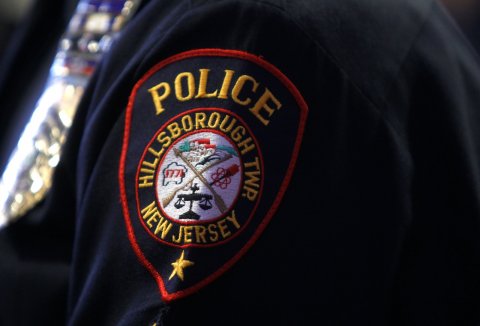 Badge, Logo, Symbol. Text: POLICE