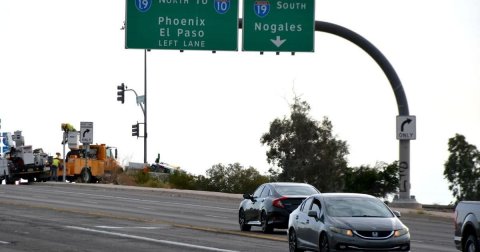 Road, Freeway, Traffic Light. Text: 19 10 SOUTH 19 Phoenix Nogales El Paso LEFT LANE ONLY