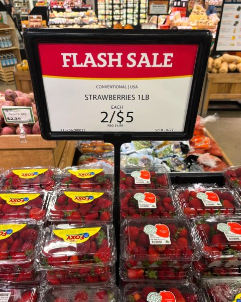 Shop, Berry, Person. Text: FLASH SALE CONVENTIONAL USA STRAWBERRIES 1LB EACH $2.30 2/$5 FOXY
