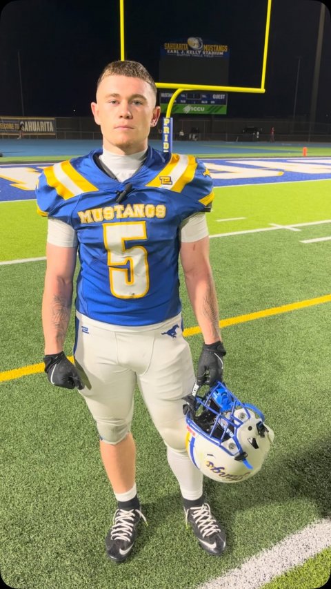 Helmet, Portrait, Glove. Text: MUSTANGS GUEST SAHUARITA MUSTANGS 5