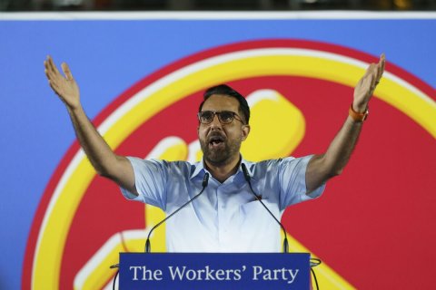 Crowd, Glove, Press Conference. Text: The Workers' Party