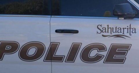 Text, Vehicle, Car. Text: Sahuarita POLICE