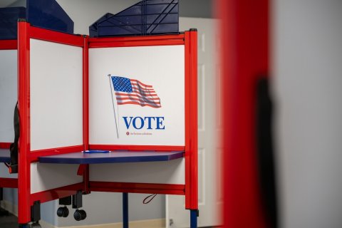 White Board, Furniture, Flag. Text: VOTE