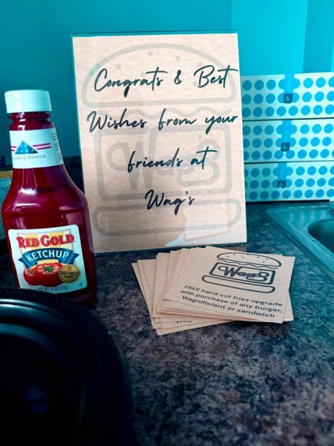 Food, Ketchup, Sink. Text: Congrats &amp; Best Wishes from your friends at Wag's RED GOLD KETCHUP with purchase cut of any burger, FREE hand fries upgrade Wagnificient or sandwich