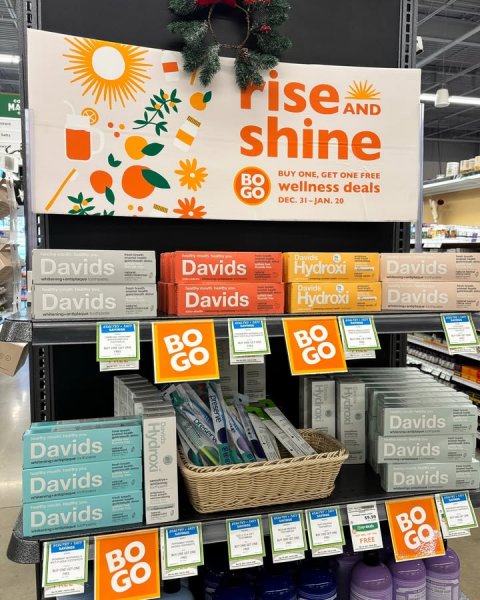 Shop, Advertisement, Indoors. Text: rise MA AND shine BUY ONE, GET ONE FREE wellness deals GO DEC. 31-JAN. 20 Davids Davids Davids Hydroxi Davids Davids Davids Hydroxi - GO GO preserve Hydroxi Hydroxi Davids