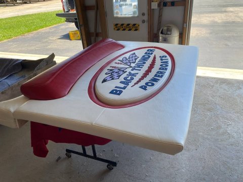 Furniture, Machine, Car. Text: BLACK THUNDER POWERBOATS