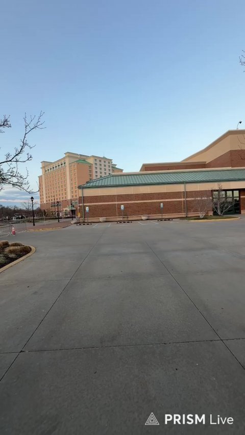 Office Building, Convention Center, City. Text: PRISM Live