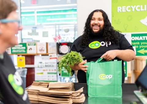 Handbag, Person, Teen. Text: RECYCLI coop