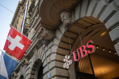Flag, Person, Switzerland Flag. Text: + UBS