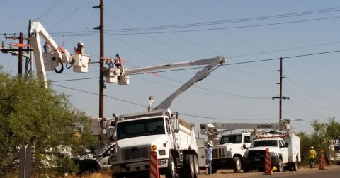 Utility Pole, Tow Truck, Person.