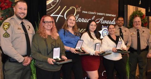 People, Person, Woman. Text: 40 th PIMA COUNTY SHERIFFS DEPARTMENT