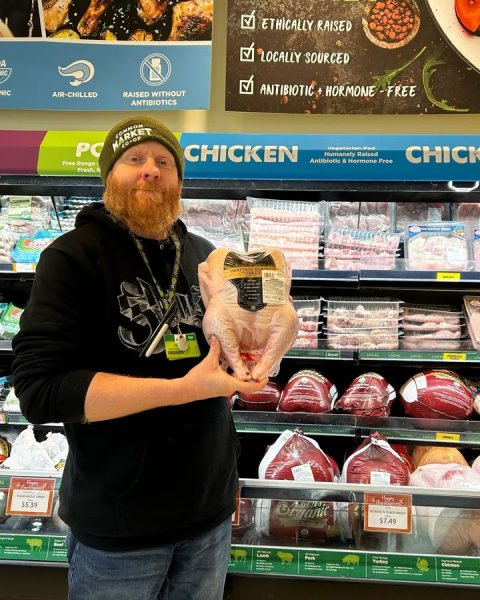 Adult, Man, Person. Text: ETHICALLY RAISED LOCALLY SOURCED A ANTIBIOTIC HORMONE - FREE NIC AIR-CHILLED RAISED WITHOUT ANTIBIOTICS MARKET CHICKEN CHICK Antibiotic &amp; Hormone Free Free Range Fresh,