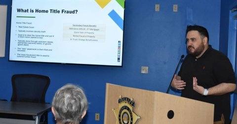 Crowd, Person, People. Text: What is Home Title Fraud?