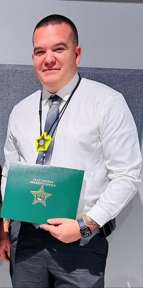 Adult, Man, Person. Text: CLAY COUNTY SHERIFF'S OFFICE