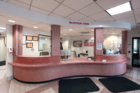 Furniture, Table, Reception. Text: RECEPTION DESK