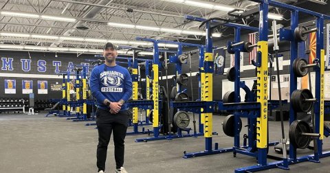 Adult, Man, Person. Text: MUST SAHUARITA FOOTBALL MUSTANGS