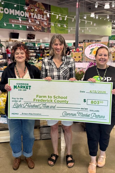 Necklace, Person, Woman. Text: SERVED FRESH DAILY SAL COMMON MARKET 4/13/2026 Date Farm to School $ Pay to the Frederick County order of Eight Hundred Three and DOLLARS Bring-a-Bag Donation MEMO $15.99