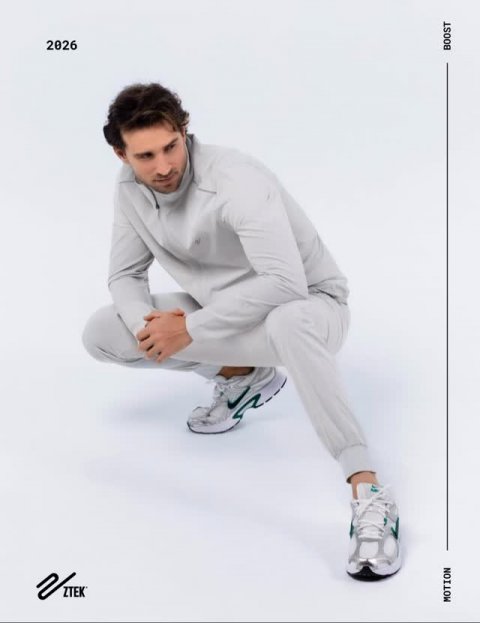 Shoe, Sneaker, Person. Text: 2026 BOOST MOTION