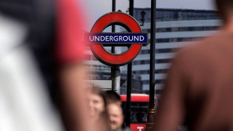 Adult, Man, Person. Text: UNDERGROUND City T