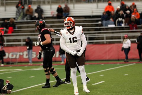 Glove, Helmet, Person. Text: 16