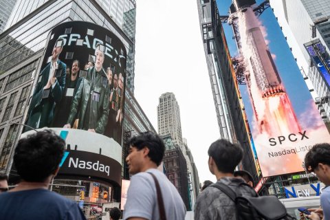 City, Metropolis, Advertisement. Text: SPCX Nasdaq NasdaqListo