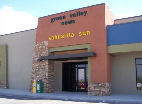 Office Building, Hospital, Hotel. Text: green valley news sahuarita sun