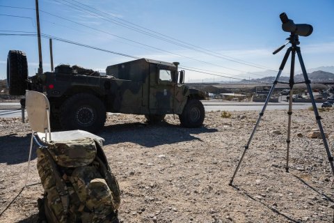 Tripod, Cannon, Person.