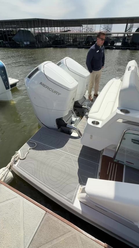 Yacht, Man, Person. Text: MERCURY