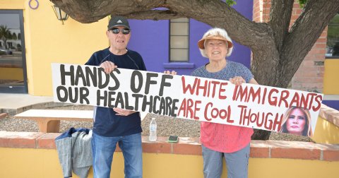 Pants, T-Shirt, Banner. Text: HANDS OFF WHITE IMMIGRANTS