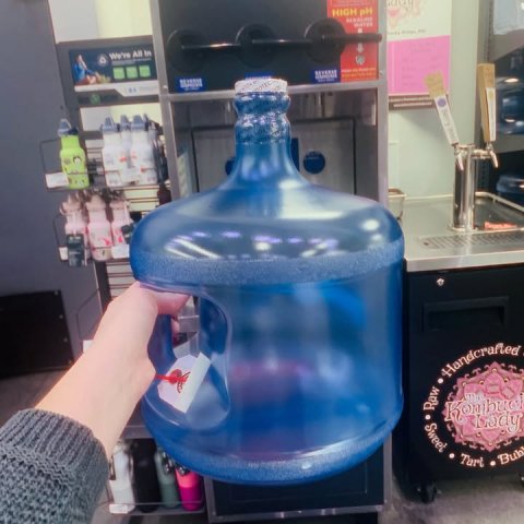 Jug, Water Jug, Person. Text: HIGH pH Raw Sweet