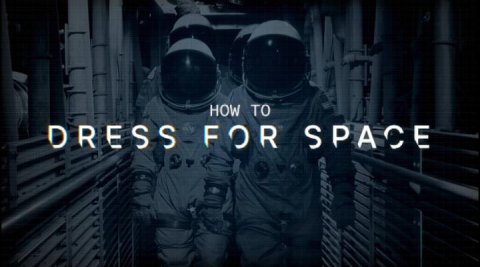 Adult, Man, Person. Text: DRESS FOR SPACE