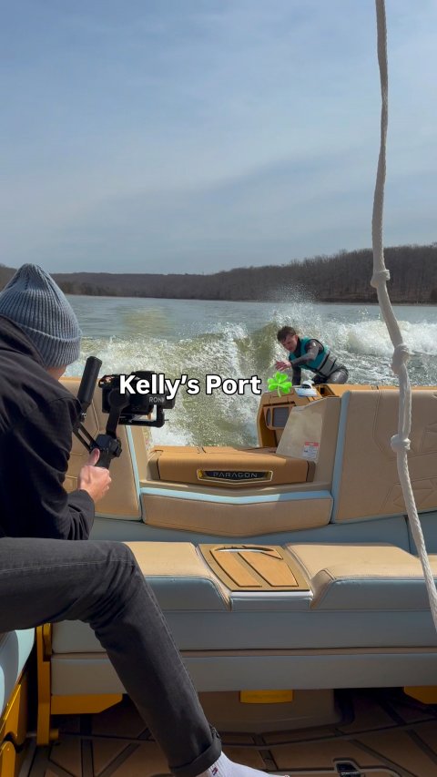 Photography, Yacht, Vest. Text: Kelly's Port PARAGON