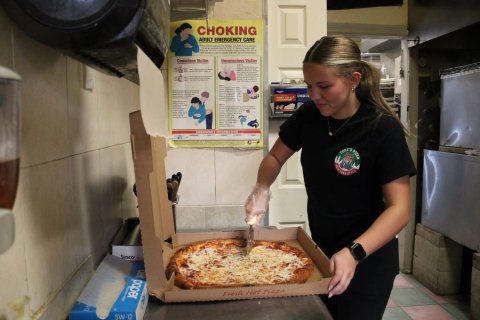 Pizza, Person, Woman. Text: CHOKING SW-12