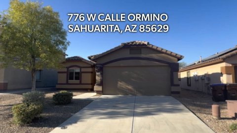 Garage, Indoors, Plant. Text: 776 W CALLE ORMINO SAHUARITA, AZ 85629